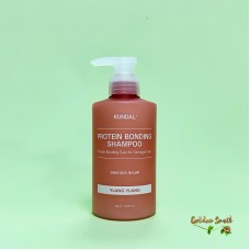 Бессульфатный восстанавливающий шампунь с ароматом иланг-иланг Kundal Protein Bonding Shampoo Ylang Ylang 500 мл